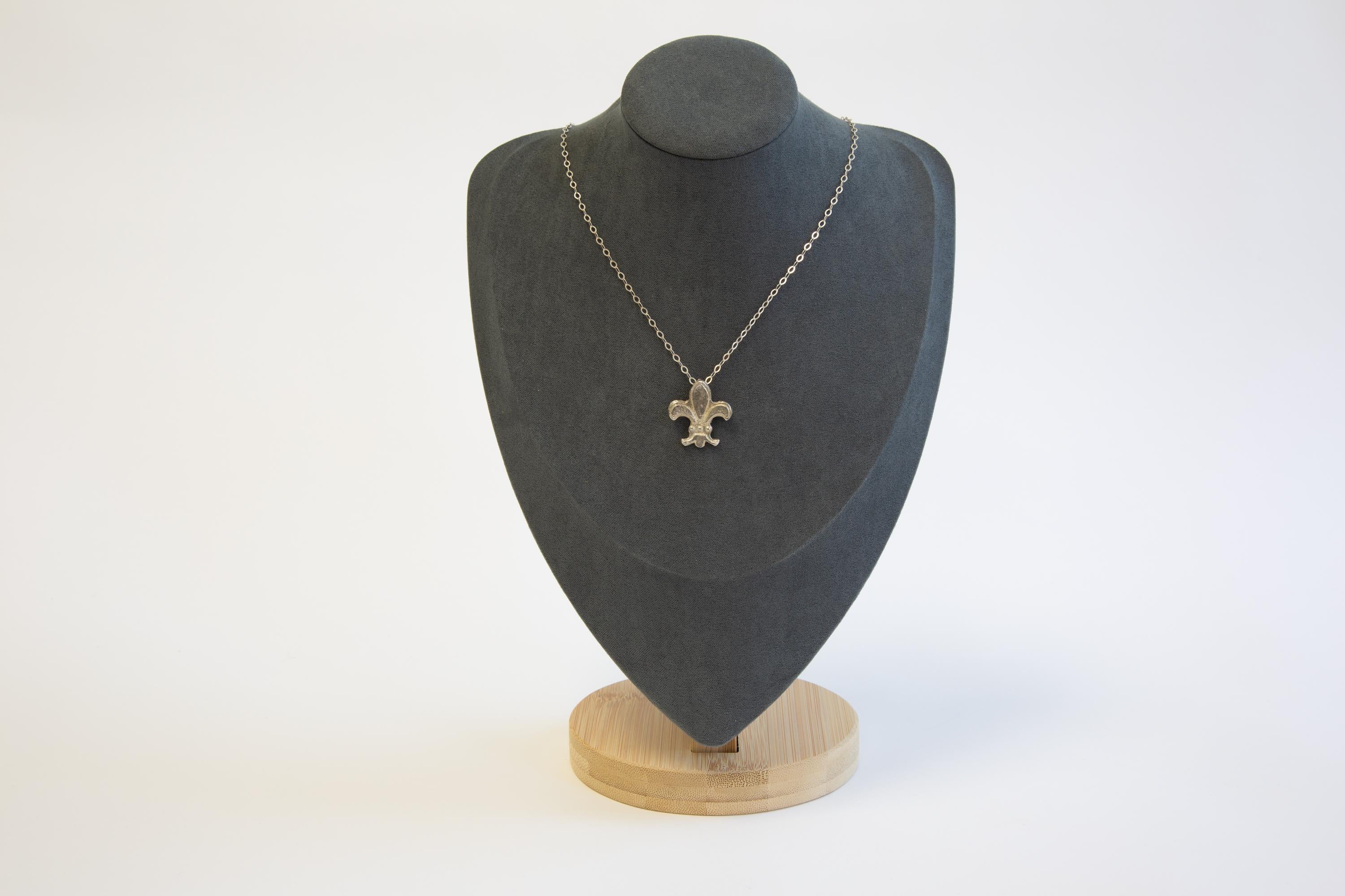 Fleur-de-lys medieval sand cast pendant in bright sterling silver with unique texture