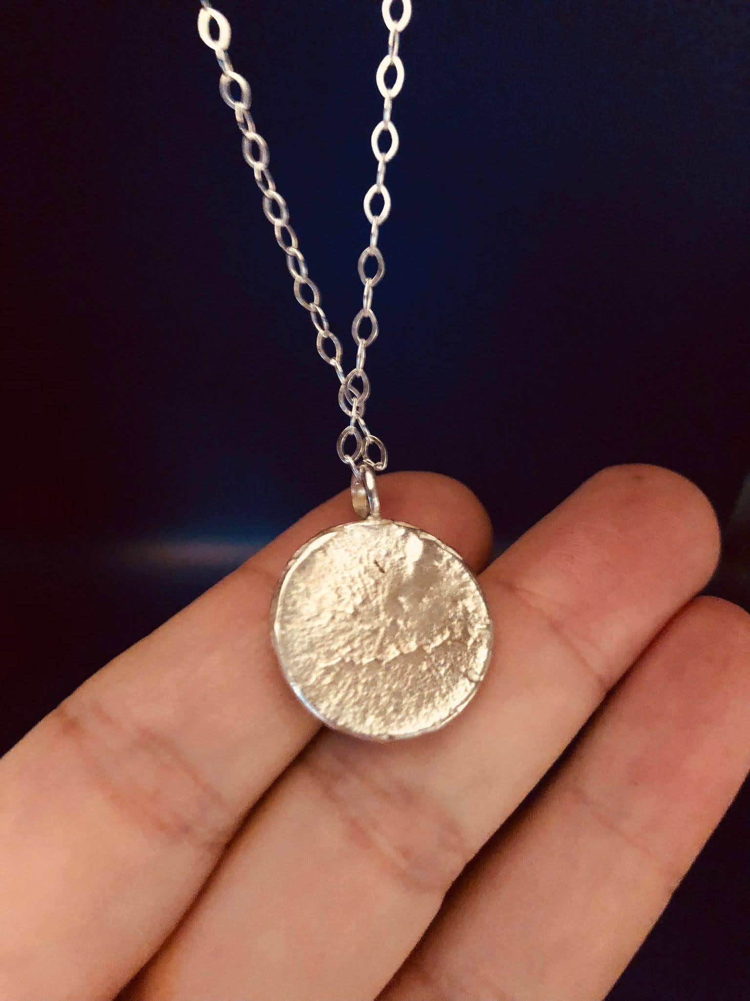 Silver Moon Disc with Ruby gem stone