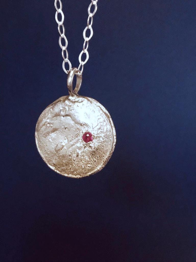 Silver Moon Disc with Ruby gem stone