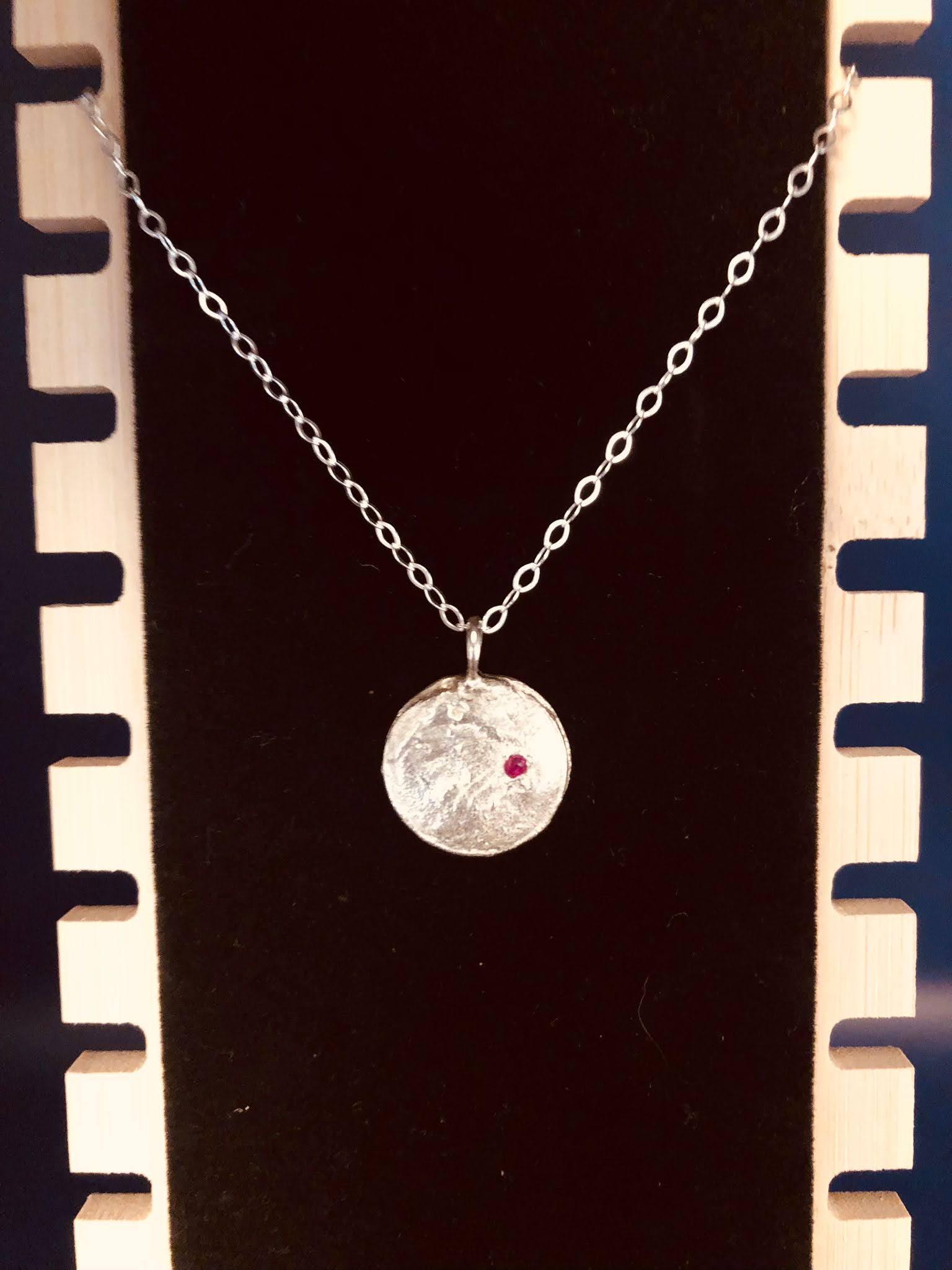 Silver Moon Disc with Ruby gem stone