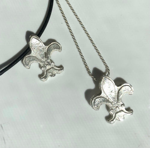 Fleur-de-lys medieval sand cast pendant in bright sterling silver with unique texture