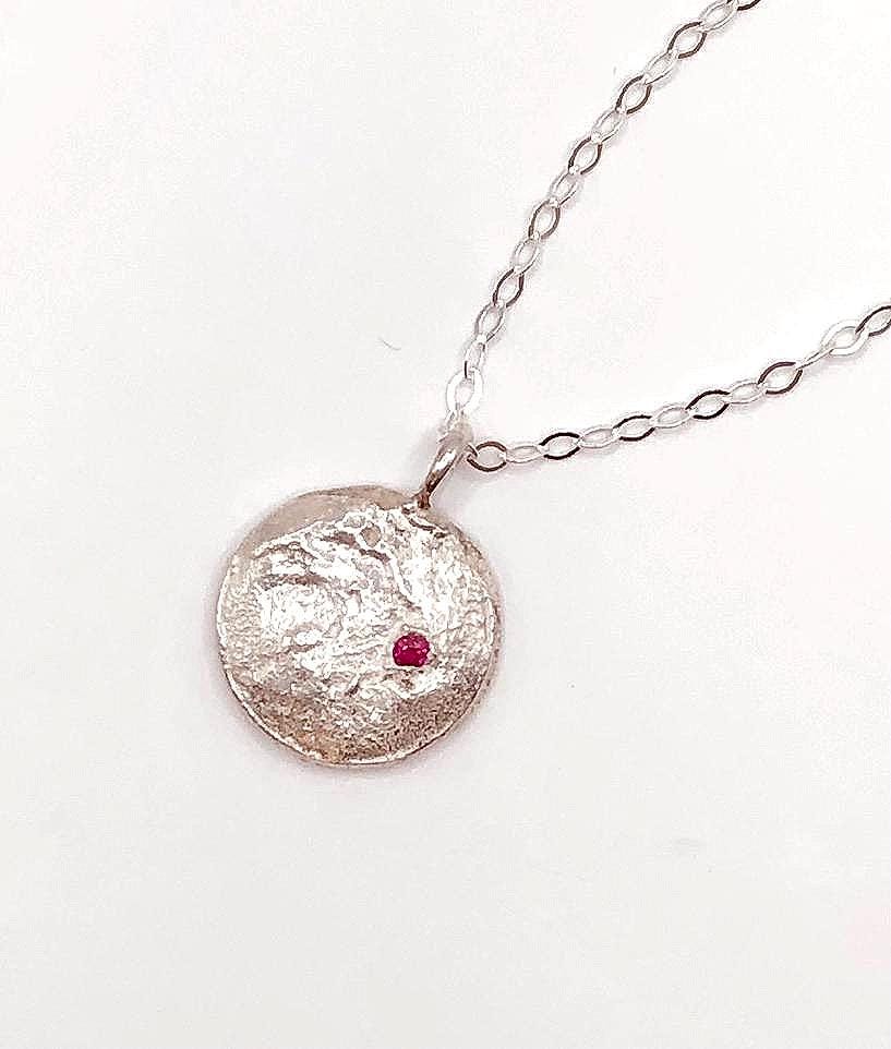 Silver Moon Disc with Ruby gem stone