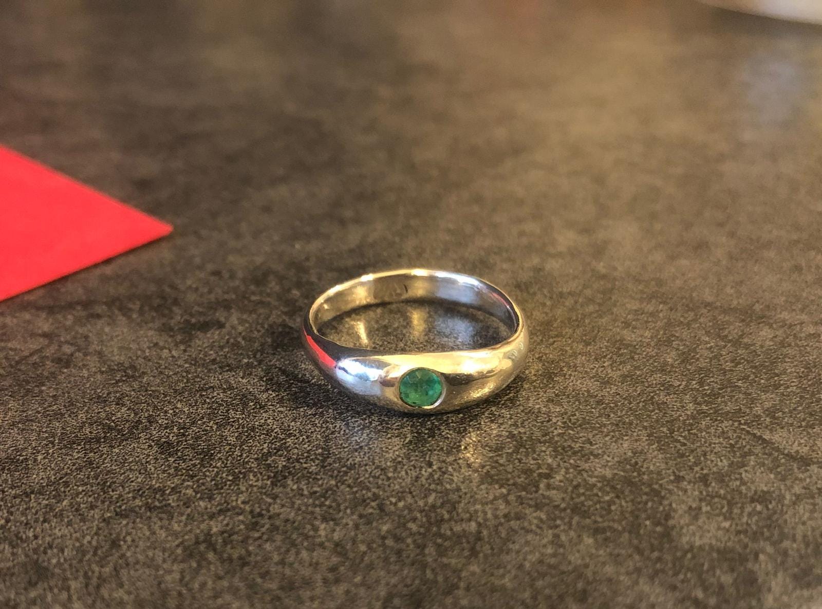Emerald in silver low dome ring with natural Colombian emerald