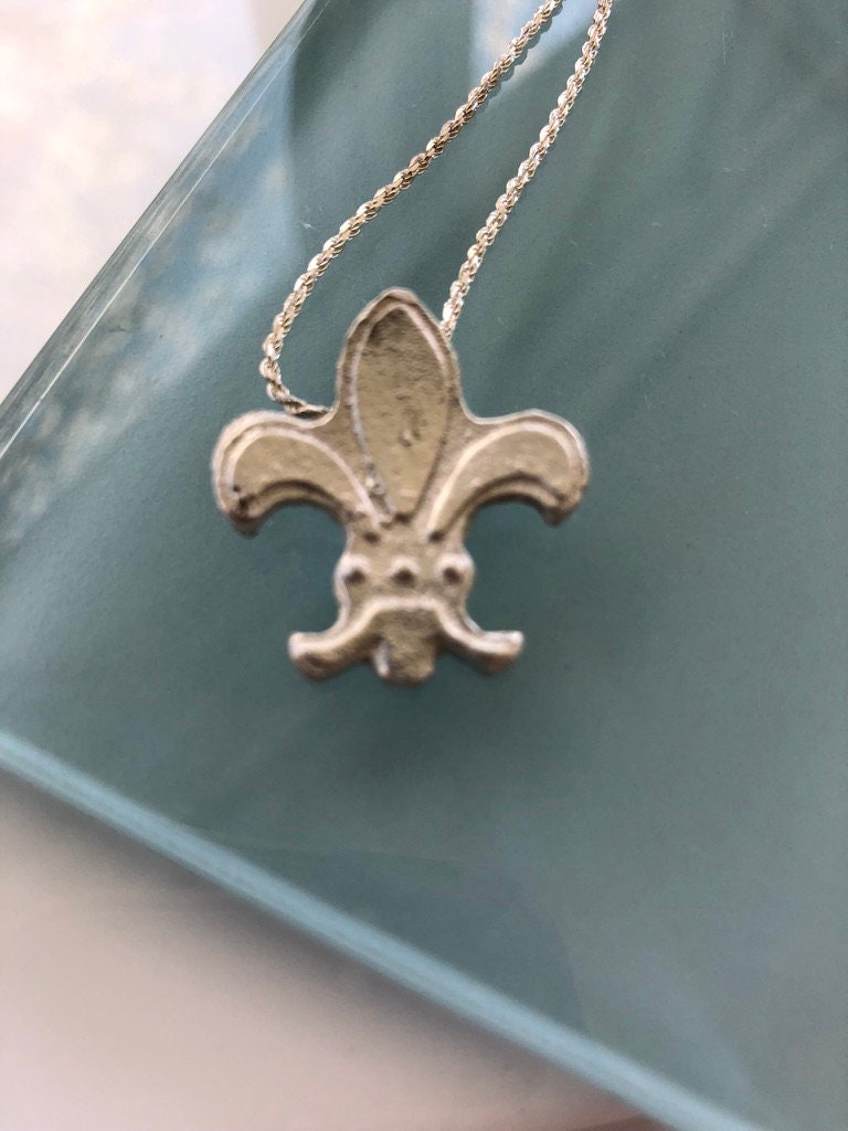 Fleur-de-lys medieval sand cast pendant in bright sterling silver with unique texture