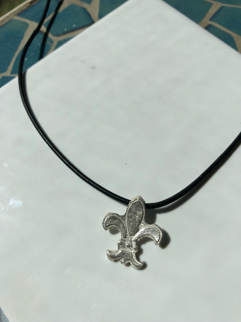 Fleur-de-lys medieval sand cast pendant in bright sterling silver with unique texture