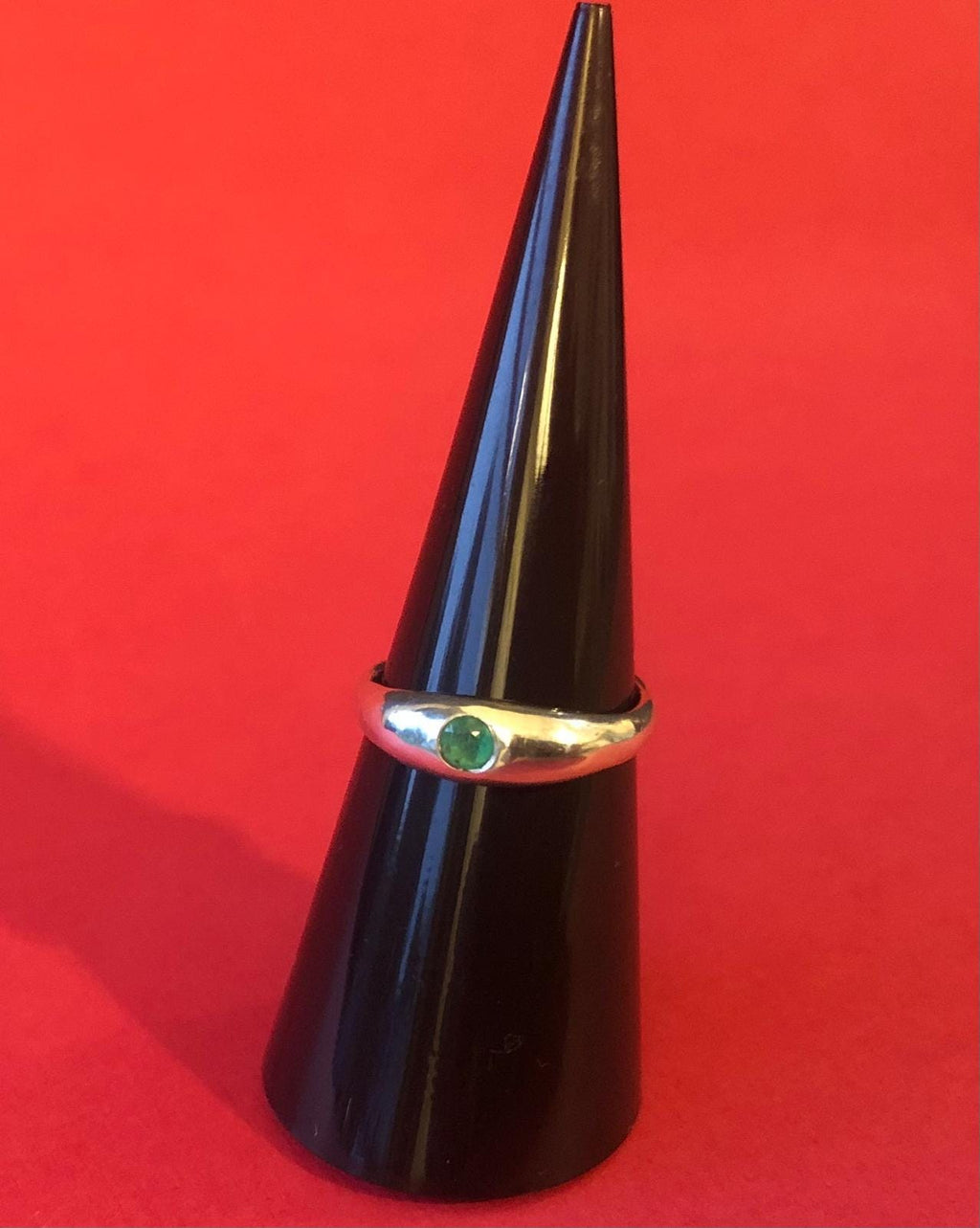 Emerald in silver low dome ring with natural Colombian emerald